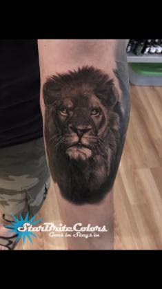 Black and Grey Lion Portrait Tattoo